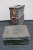 An early 20th century tin trunk and a Bentwood travelling trunk.