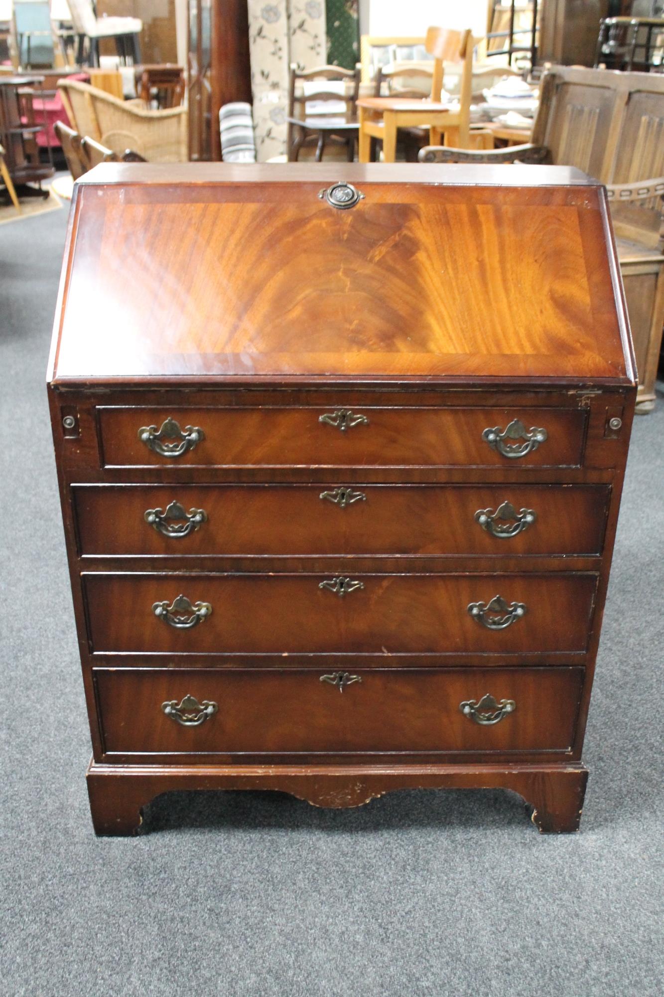 A Regency style mahogany bureau.