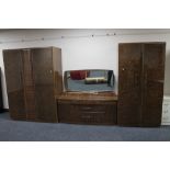 A mid 20th century Beautility teak three piece bedroom suite.