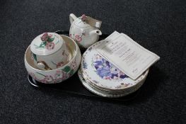 A tray of four Royal Albert Flowers from the gardens of The Queen Mother plates with certificates,