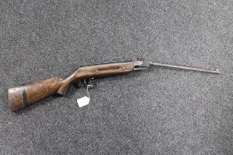 A mid 20th century spring loaded air rifle