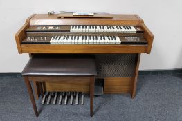 A 20th century Lyric electric organ with stool