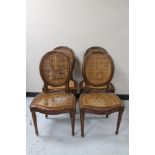 Four reproduction bergere seated dining chairs (a/f)