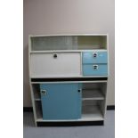 A mid 20th century painted kitchen cabinet