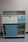 A mid 20th century painted kitchen cabinet