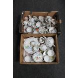 Two boxes of Japanese china and egg shell tea services