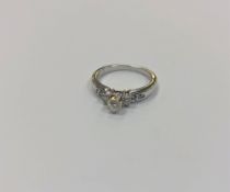 A 14ct white gold diamond set ring,