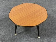 A mid 20th century shaped melamine topped coffee table.