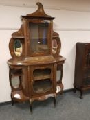A continental inlaid mahogany display cabinet,
