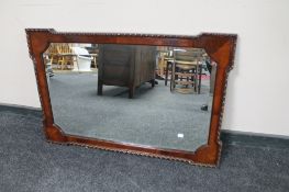 A Victorian mahogany framed hall mirror.