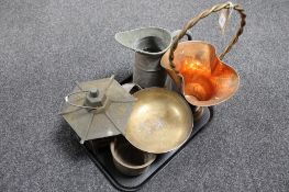 A tray of antique and later metalware, hammered copper fire basket, antique copper jug,