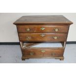 A George III provincial elm four drawer chest (a/f).