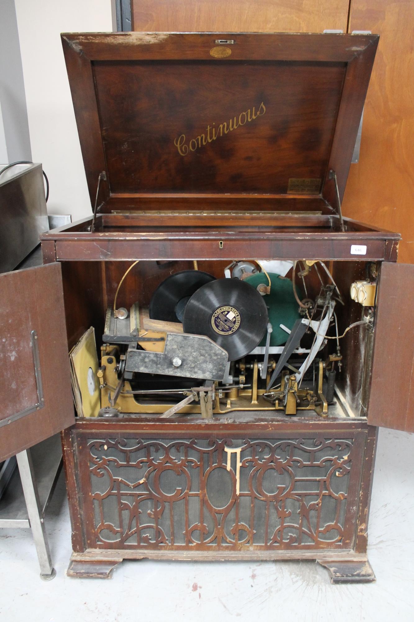 An early 20th century mahogany cased Continuous gramophone manufactured by Continuous Gramophones