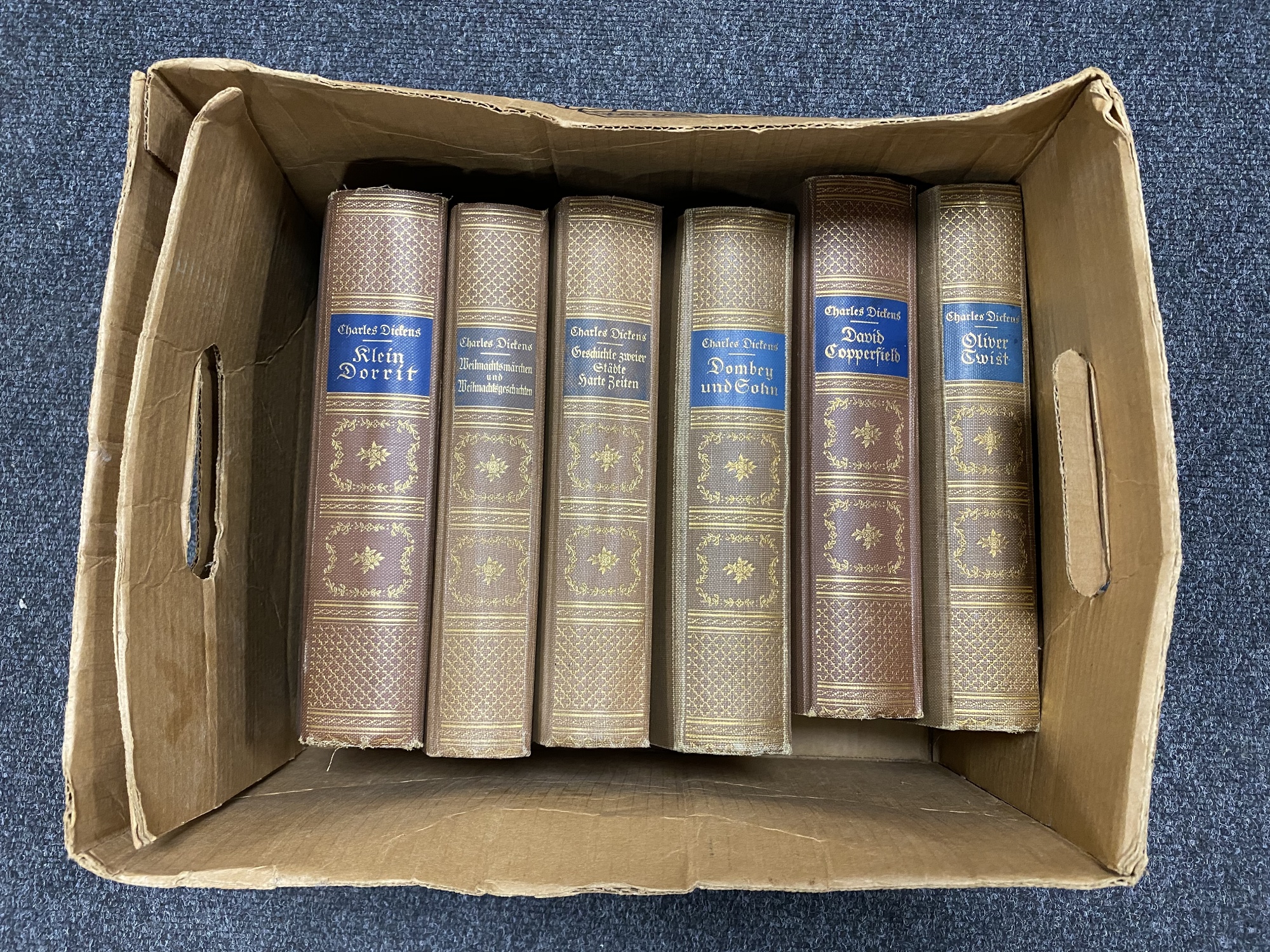 Six antique Charles Dickens volumes in German