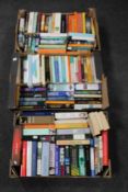 Three boxes of paperback books, novels,