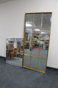 A 20th century sectional mirror and an all glass mirror.