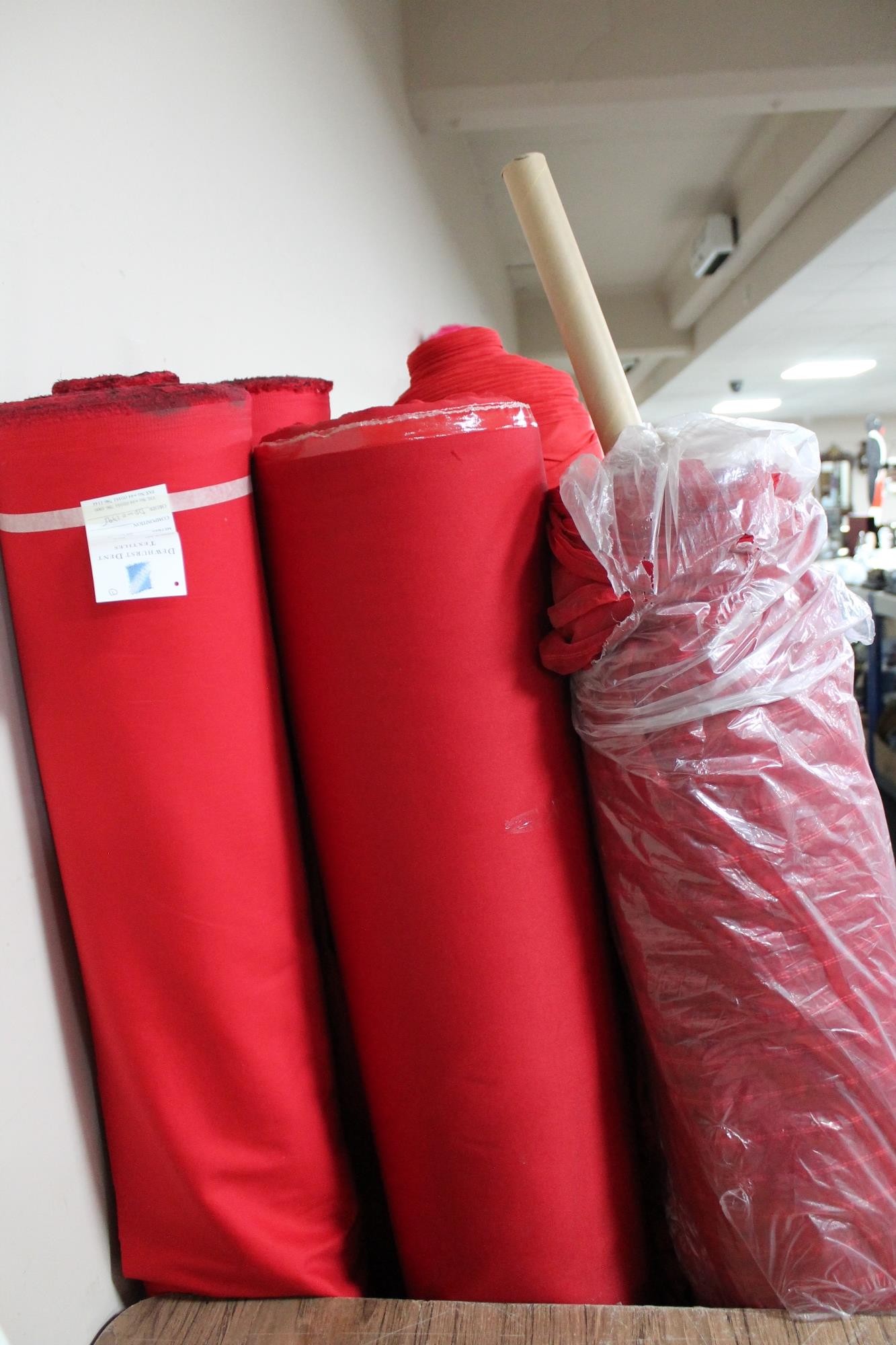 Six rolls of material (red)