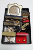 An Art Deco silver plated photo frame, large collection of gent's cuff links, watch fobs,