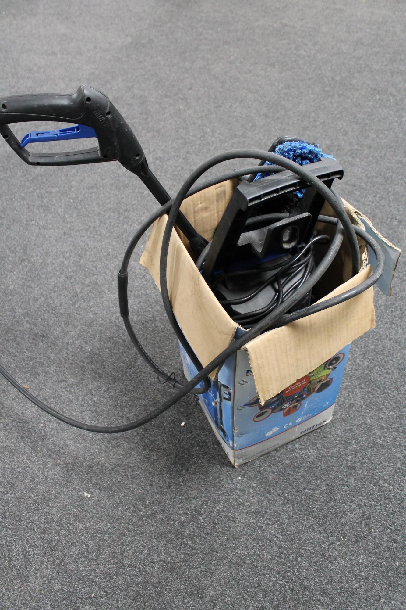 A boxed Milfisk pressure washer