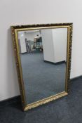 A contemporary gilt framed overmantel mirror.