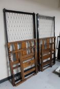 A pair of Edwardian oak barley twist 3' bed frames with box springs