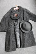 A lady's quilted fur jacket with matching hat together with one other hat and shoulder bag