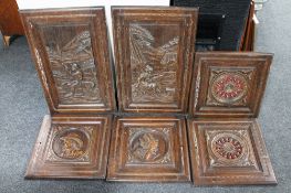 Six carved continental oak panels.