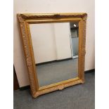 An ornate gilt framed mirror,