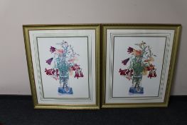 Two large gilt framed prints depicting lilies in vases
