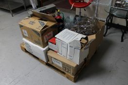 A pallet of metal plate stands, drinking glasses, wooden easel, fire extinguishers, etc.