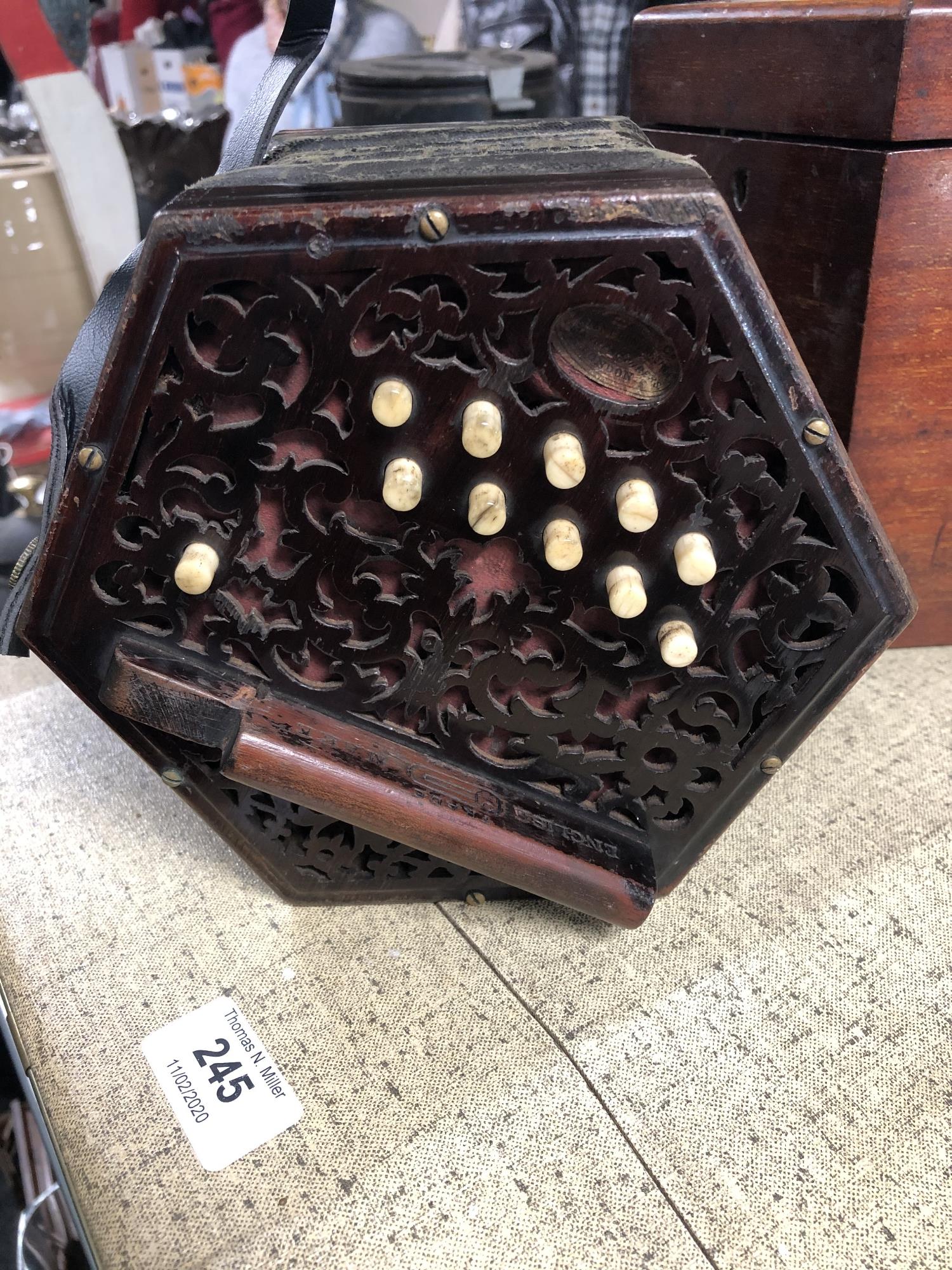 An antique English concertina with rosewood fretwork ends labelled Lachenal & Co, - Image 4 of 13