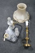 A tray of early 20th century cut glass lamp base, glass decanter, drinking glasses,