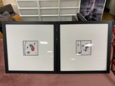 A pair of Japanese black framed prints depicting hanging baskets and foliage