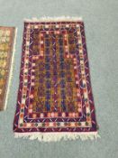 An Afghan prayer rug,