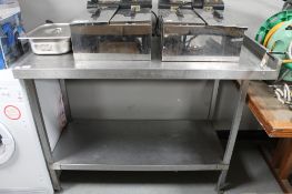 A stainless steel two tier prep table