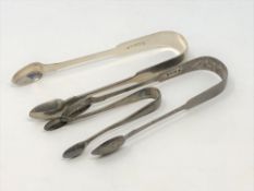 Three pairs of silver sugar tongs including a Newcastle silver pair (3) CONDITION REPORT: