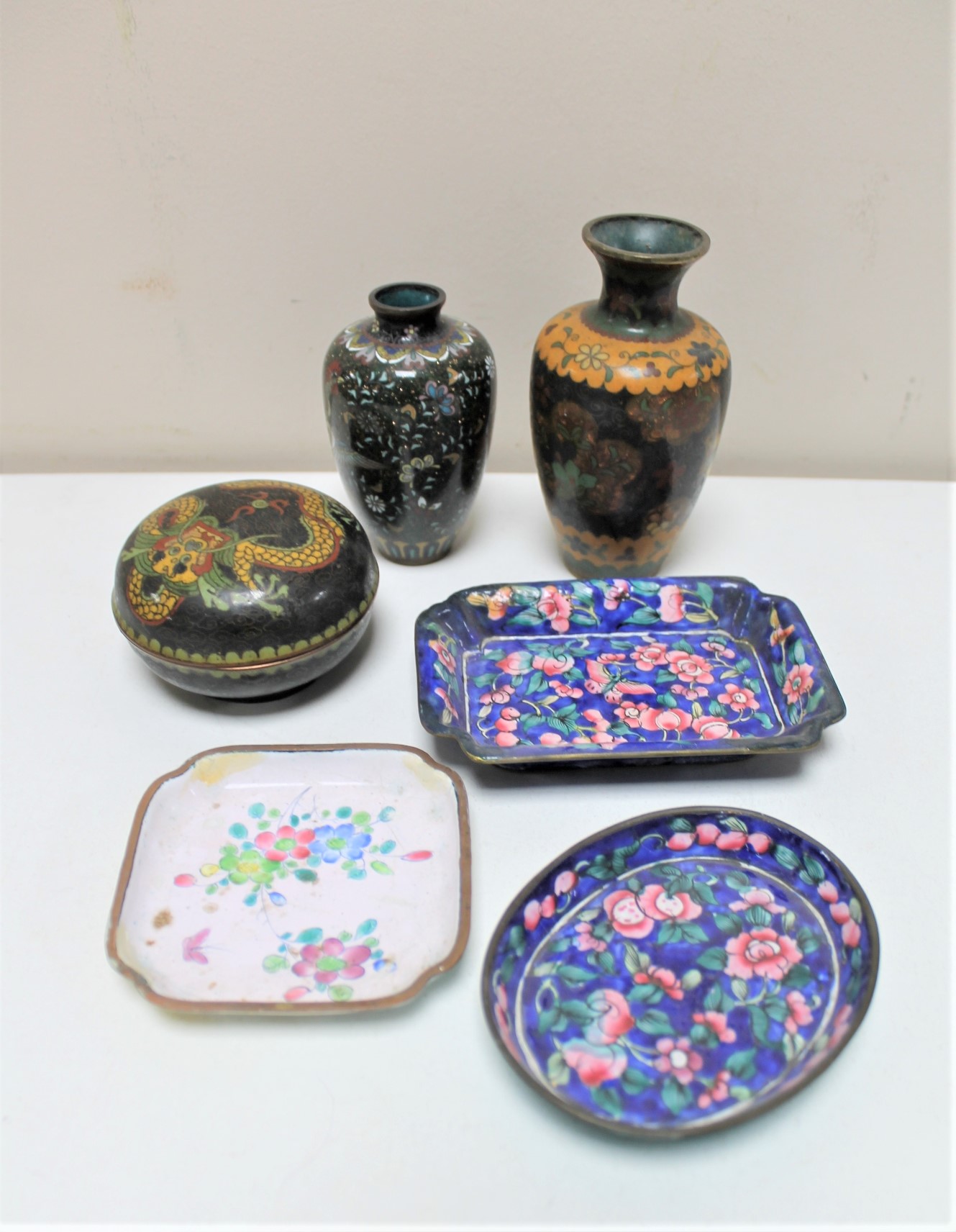 Two cloisonne vases together with a dragon designed trinket pot and three shallow dishes