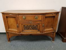 An Arts & Crafts oak sideboard,