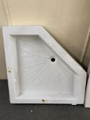 A fibre glass shower tray