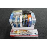 A box of Airfix Tamiya trumpeter plastic modelling kits