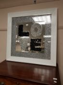 A contemporary framed 'Love' mirror