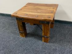 A sheesham wood lamp table