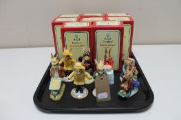 Eight boxed Royal Doulton Bunnykins figures - Boy Skater, Gardener, Be Prepared, Rainy Day etc.