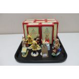 Eight boxed Royal Doulton Bunnykins figures - Boy Skater, Gardener, Be Prepared, Rainy Day etc.