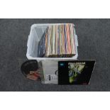 A plastic crate of LP's, rock and pop,