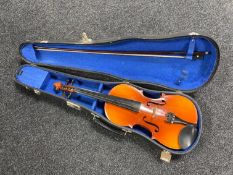 A Chinese violin and bow in hard carry case