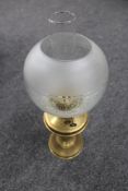 An antique Duplex oil lamp with glass chimney and shade