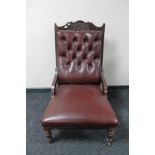 An Edwardian lady's chair in red buttoned leather