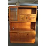 A mid century teak cocktail sideboard