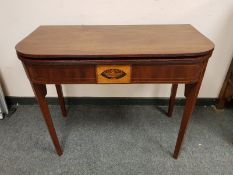 A 19th century inlaid mahogany tea table, width 91.